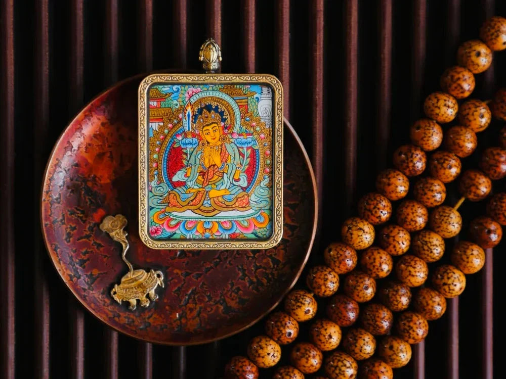 Symbolism in Miniature: Decoding the Deities on Thangka Pendants