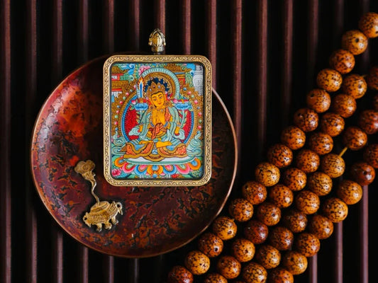 Symbolism in Miniature: Decoding the Deities on Thangka Pendants