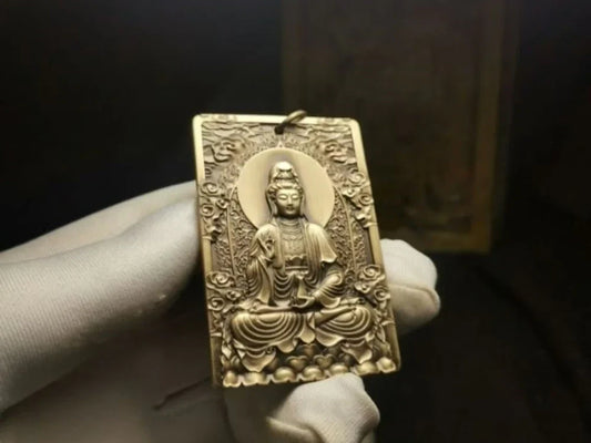 Compassion Carried Close: The Brass Guanyin Bodhisattva Amulet Necklace