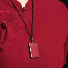 古代の辰砂の平和とトラブルのペンダント